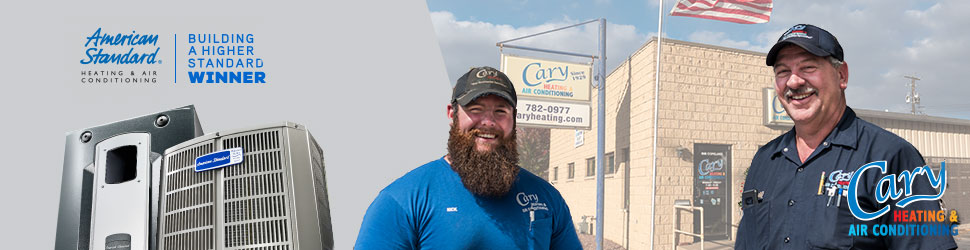 Bill & Nick standing in front of Cary Heating building